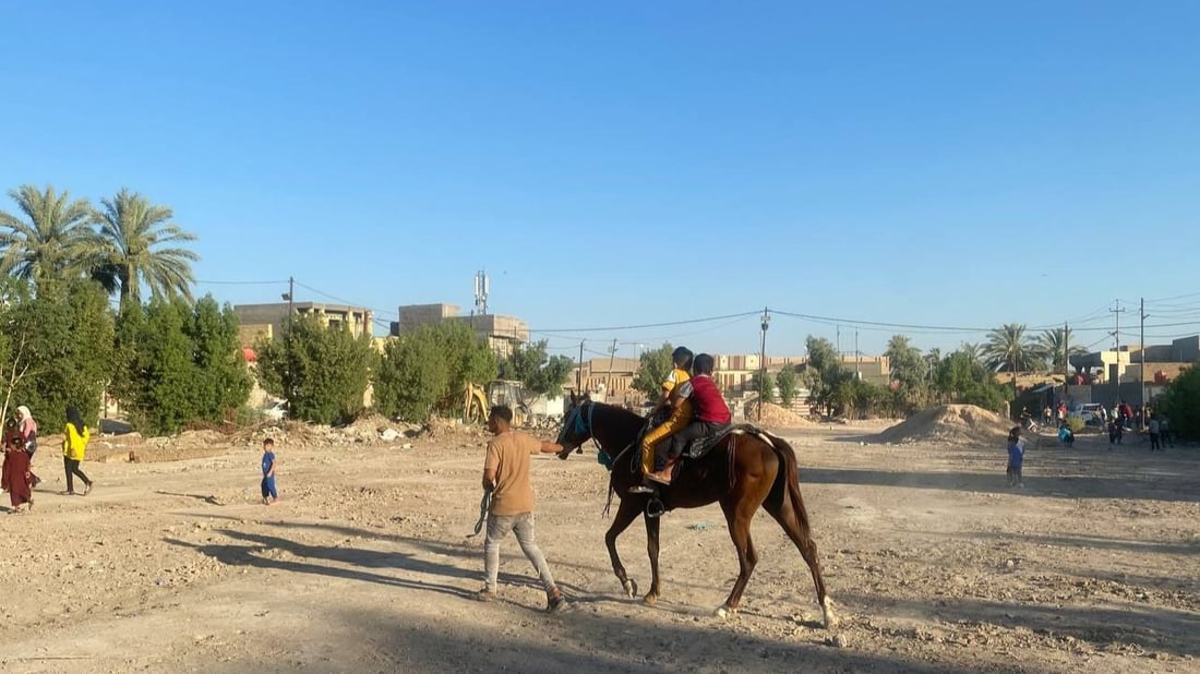 صور: خيول للإيجار ودراجات ودواليب تفرح أطفال الهاشمية في بابل