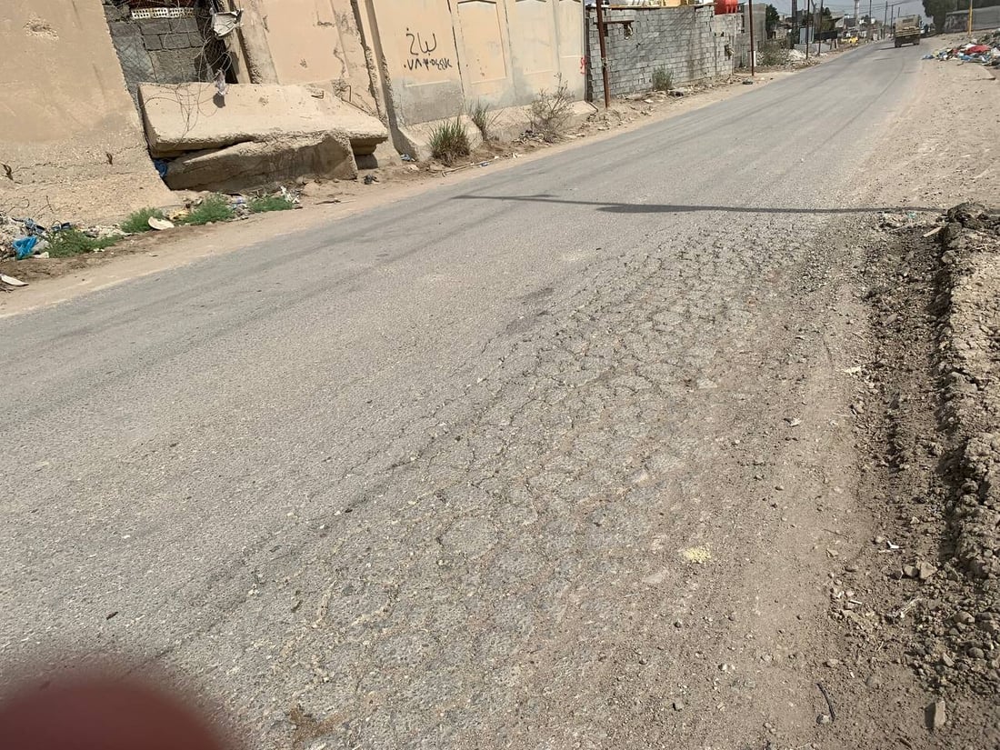 صور من هور رجب: شارع خط النفط مبلّط.. لكنه ضيق ومتخسف بسبب الشاحنات