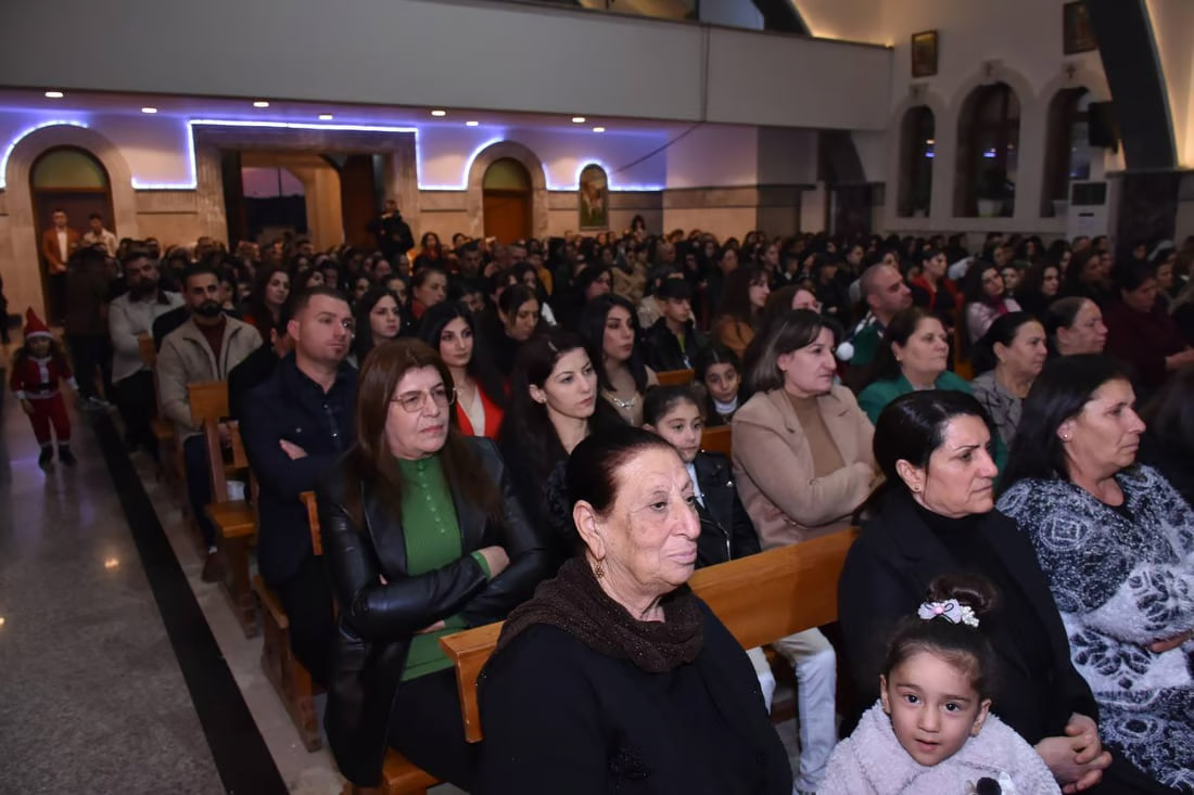 Photos: Somber Christmas Mass in Hamdaniya