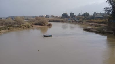 الصيادون يهرعون الى نهر الزاب في التون كوبري خلال موجة المطر (فيديو)