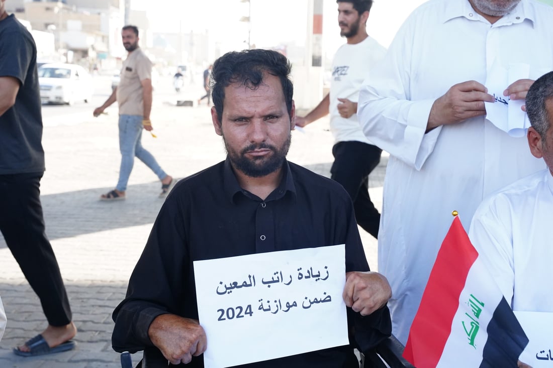 صور: تظاهرة على الكراسي المتحركة في النجف.. ذوو الهمم يريدون حصتهم بالموازنة