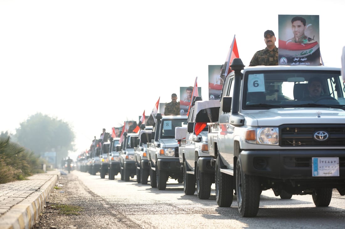 صور: الحشد يستذكر قصف معسكراته في القائم بتشييع رمزي
