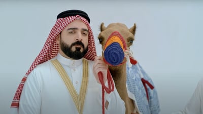 Iraqi political satirist raps up desert tunes