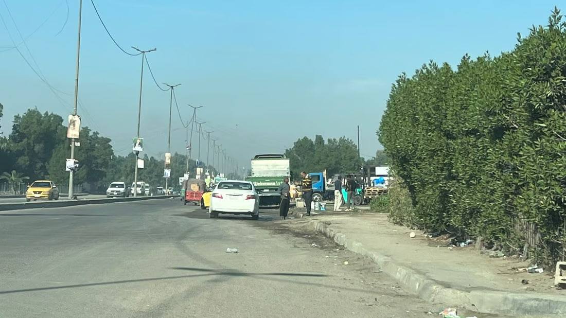 Illegal car washes flourish in Baghdad’s Al-Baladiyat district