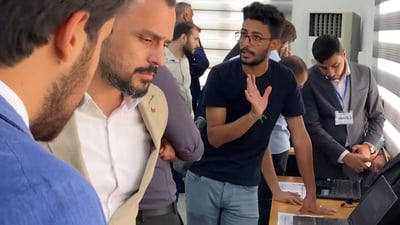Kufa University showcases AI innovations