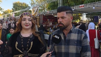 بە دەزگیرانی و قۆڵ لەناو قۆڵی یەک چوونەتە فێستیڤاڵی هەناری هەڵەبجە