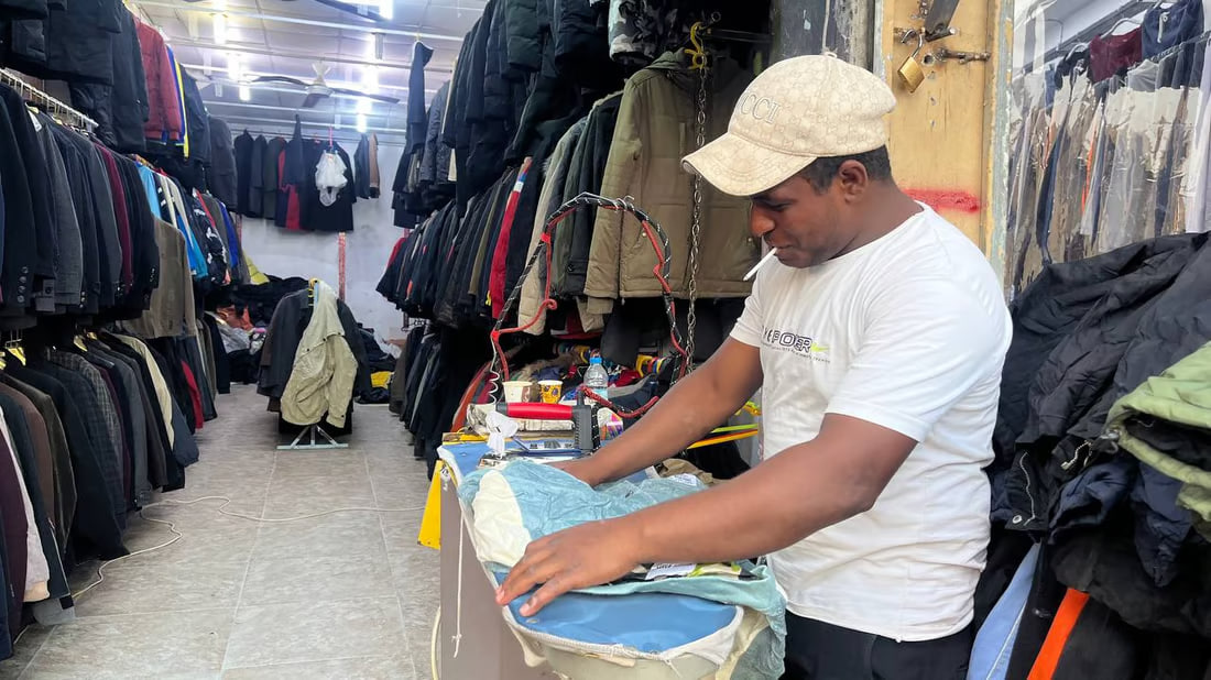 Second-hand winter clothes market in Basra offers global brands at bargain prices