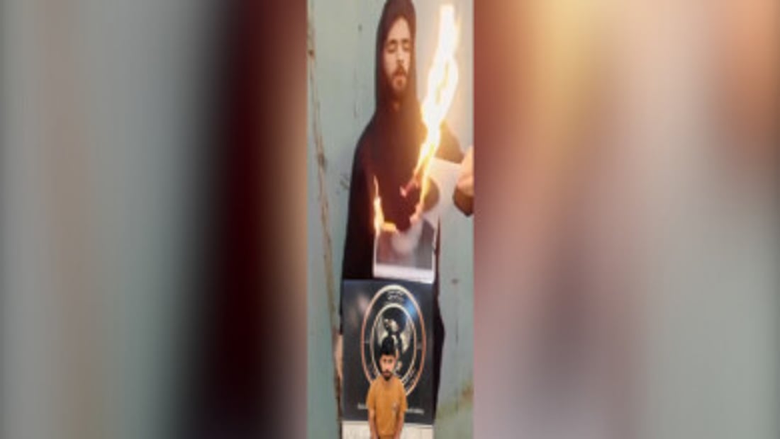 Man arrested after video appears to show photograph of Sistani being burned