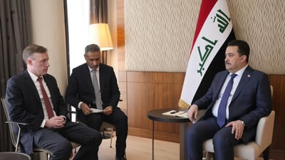 Iraqi PM meets in Davos US National Security Advisor
