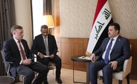 Iraqi PM meets in Davos US National Security Advisor