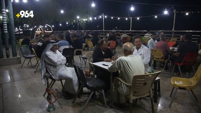 Samawah’s river corniche comes alive at night with cafés, games, and family gatherings