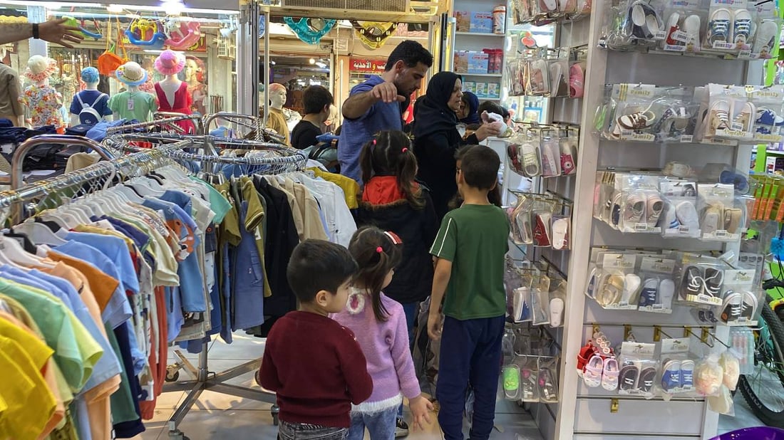 لە خانەقین جلوبەرگی جەژن بۆ منداڵانی بێ باوک دابینکرا