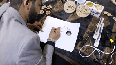 Samarra artist turns to Arabic calligraphy after physics degree