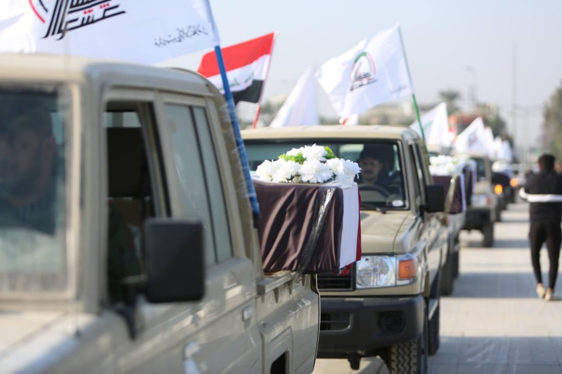 صور: الحشد يقيم تشييعاً رمزياً لضحاياه الذين سقطوا بقصف أميركي 2019