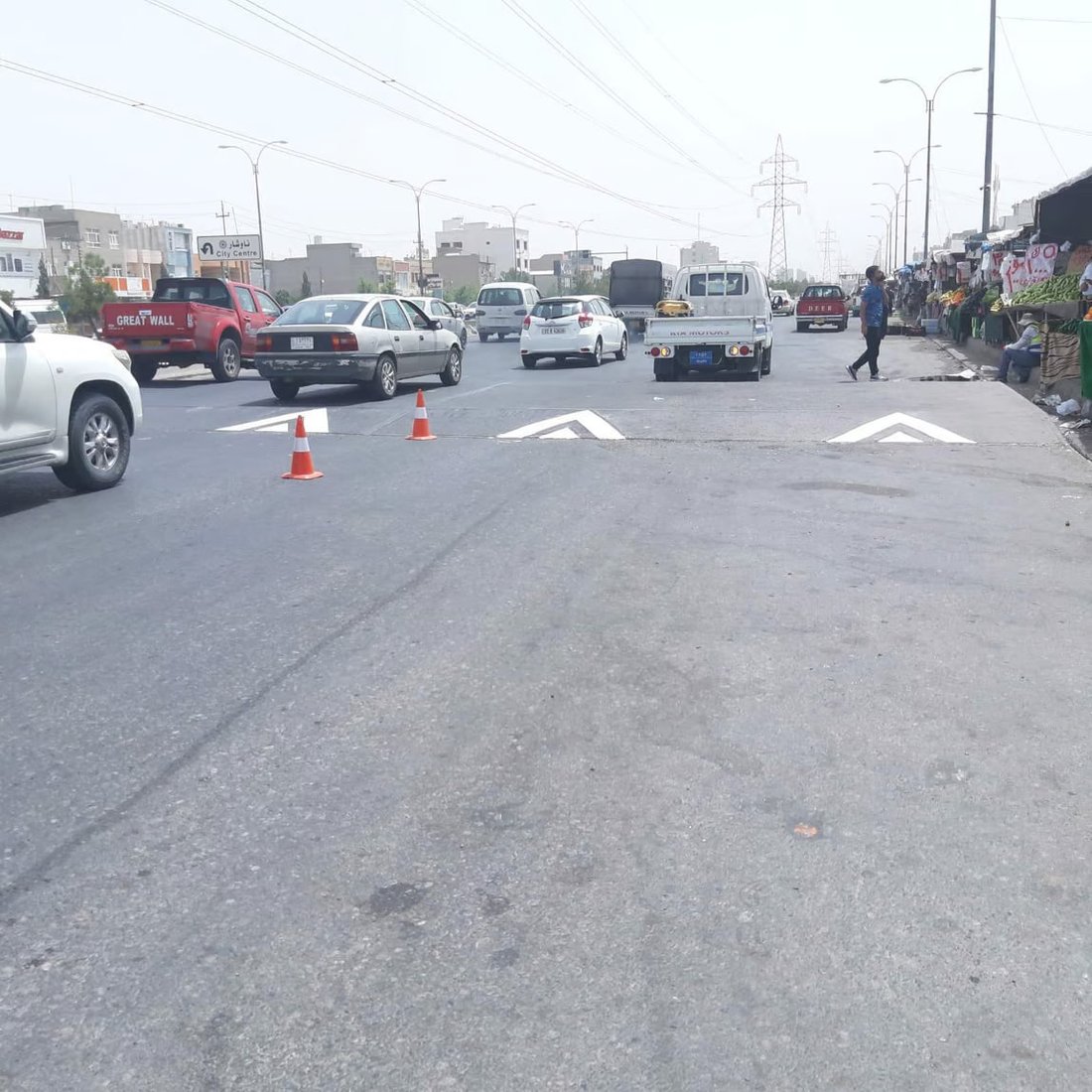 صور من أربيل: طلاء بالأبيض الفسفوري لتحذير سائقي المركبات من المطبات الصناعية