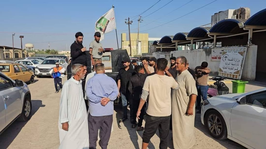 صور: غواصو سرايا السلام ينتشلون جثة طفل من نهر الديوانية