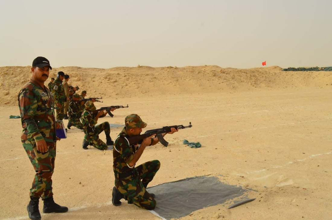 صور من تدريب العقود الجدد على مهارات الرماية في كربلاء