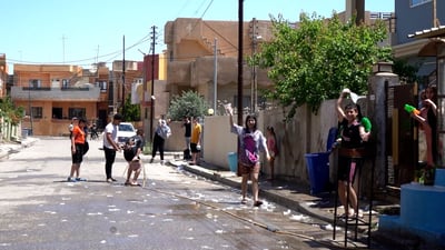 لە کۆڵانەکانی حەمدانیە شەڕە ئاوە