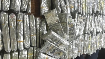 Cash found under flooring and in a false ceiling at deputy minister’s homes