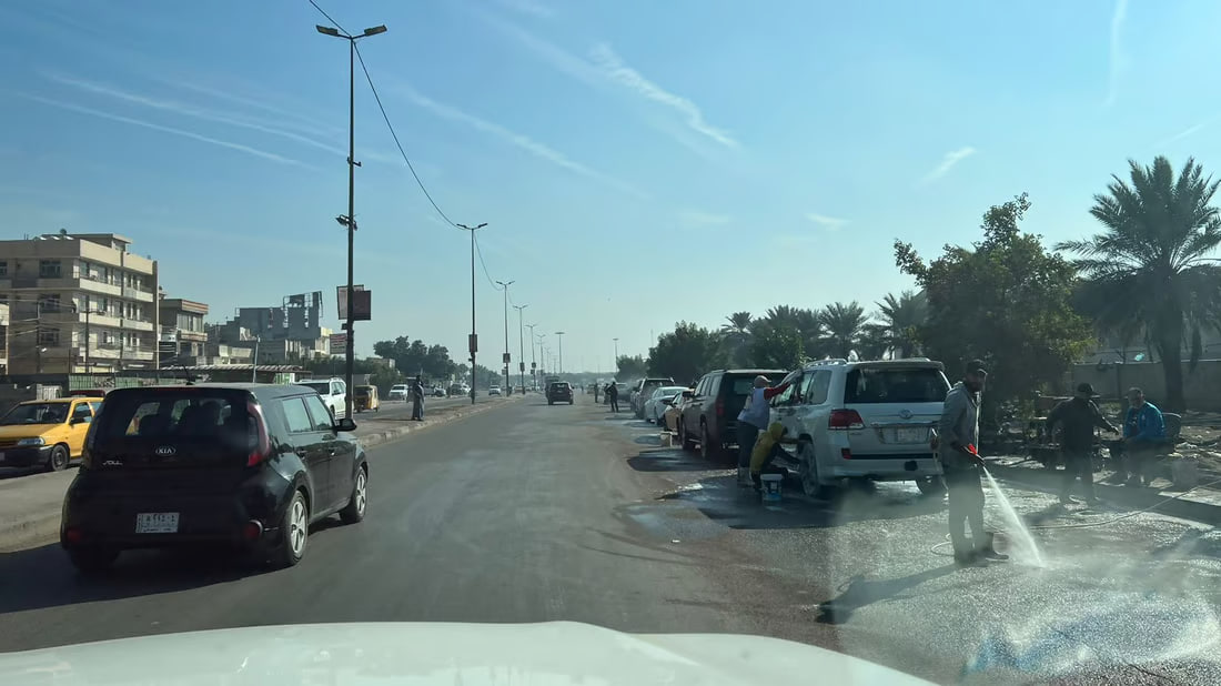 Illegal car washes flourish in Baghdad’s Al-Baladiyat district