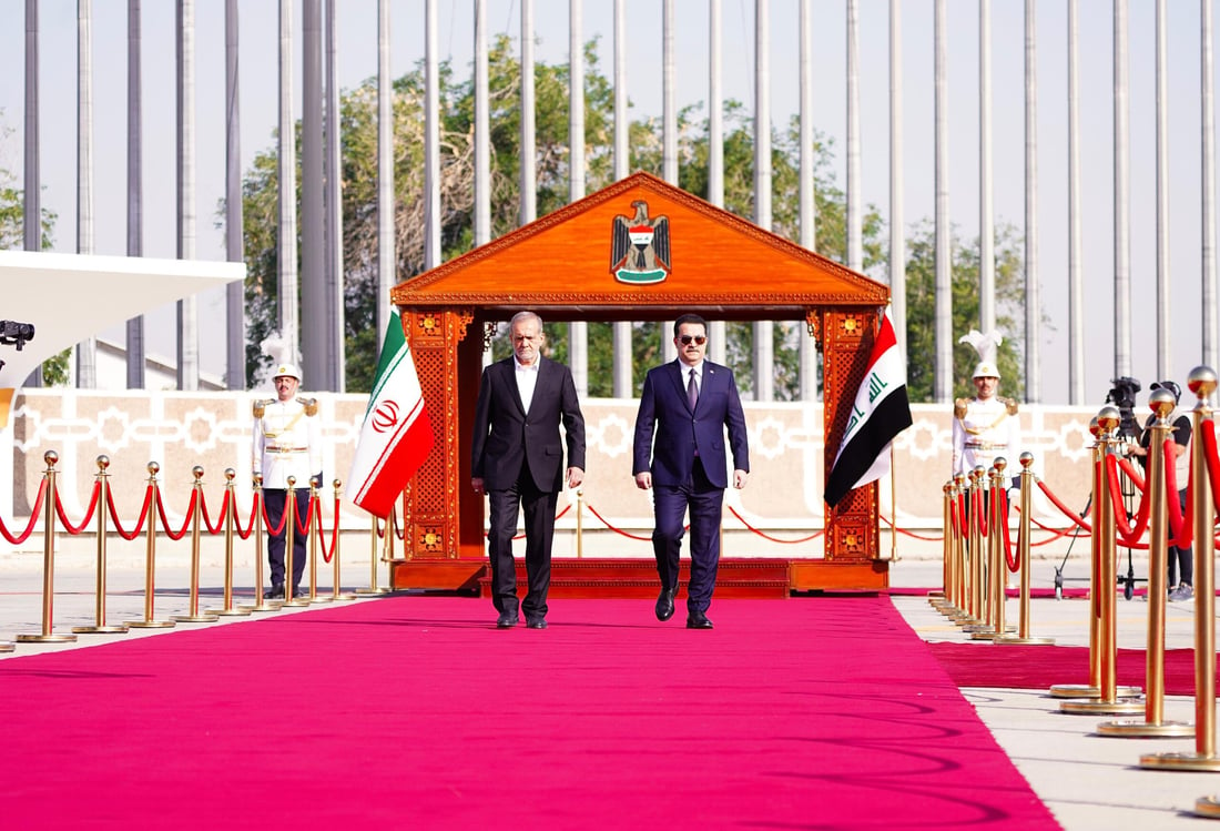 صور من الاستقبال الرسمي للرئيس الإيراني في بغداد