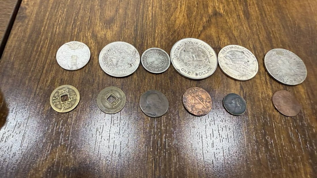 Basra lawyer donates rare coins to antiquities office to preserve heritage