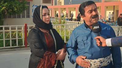 بە جلوبەرگی رەسەنی کوردییەوە و بە خێزانی چوون بۆ دەنگدان