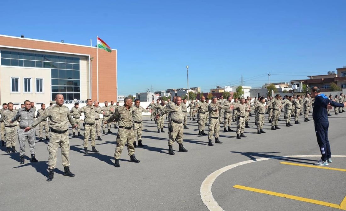 Duhok Police officers taking part in a physical training session