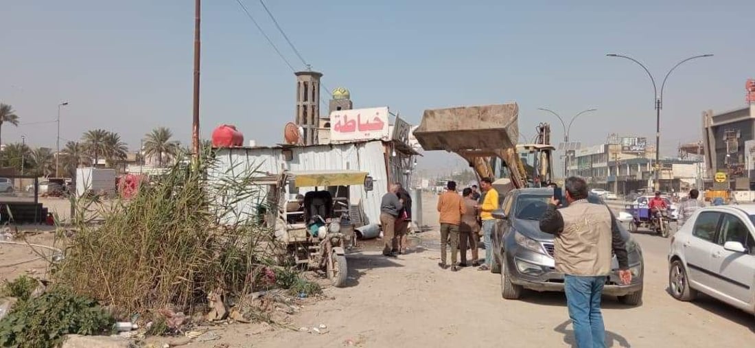 صور: التجاوزات تخنق شوارع الحلة واتهامات حكومية لمتنفذين بإفشال حملات الإزالة