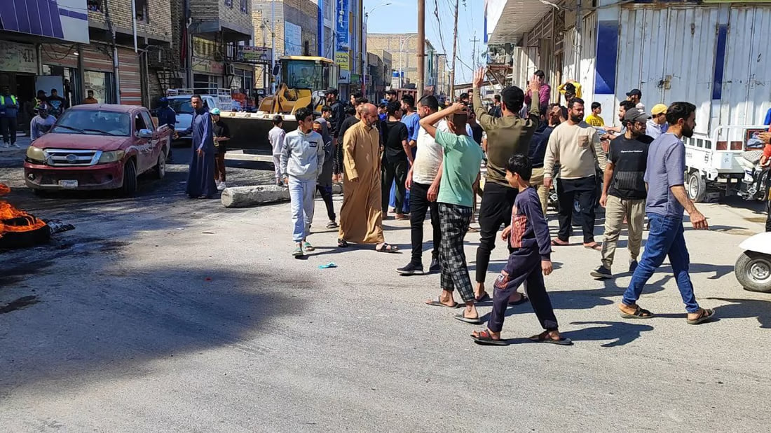 Nasiriyah protestors block main roads with burning tires
