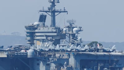 “درۆنێکی ئێرانمان خستەخوارەوە کاتێک لە کەشتی ئەبراهام لینکۆڵن نزیکبووەوە”