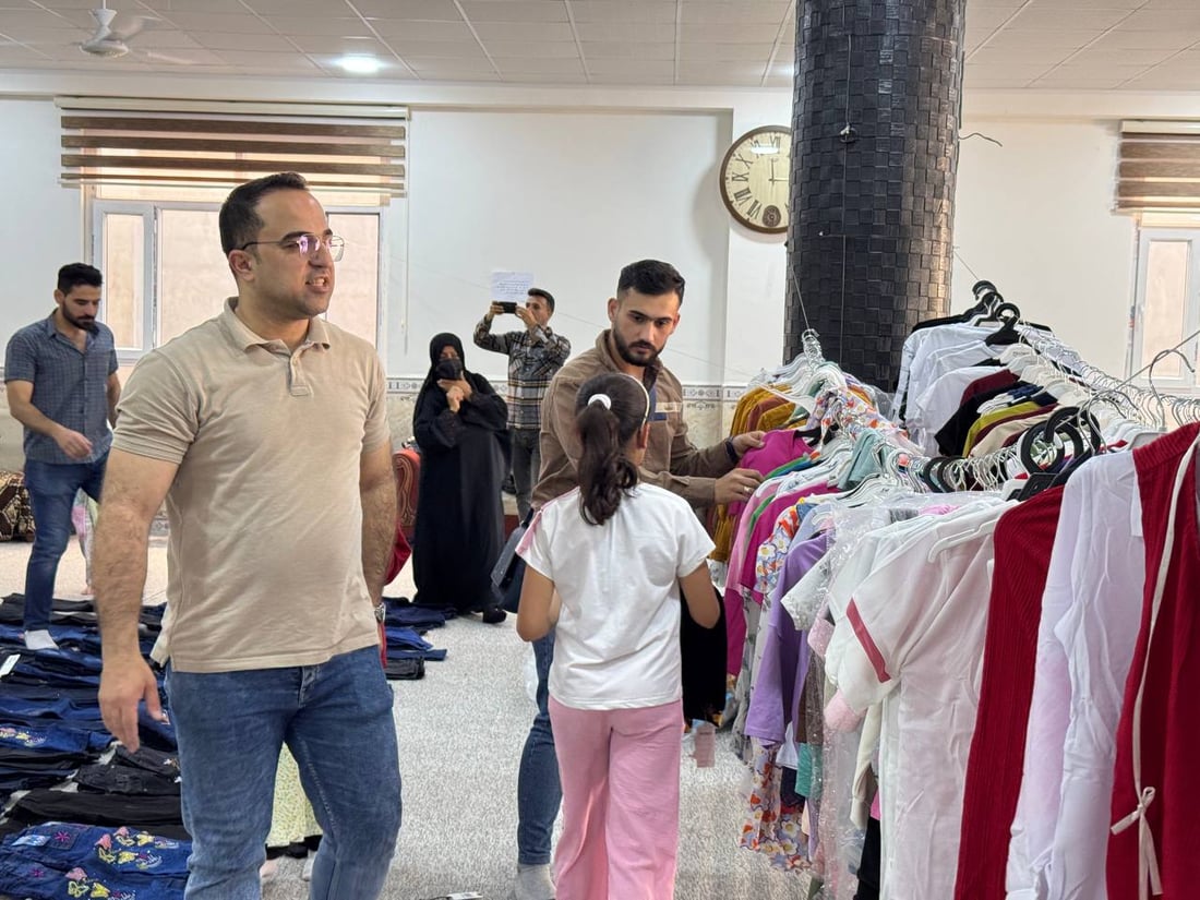 لە خانەقین منداڵانی بێباوک و کەمدەرامەت جلی جەژنیان وەرگرت