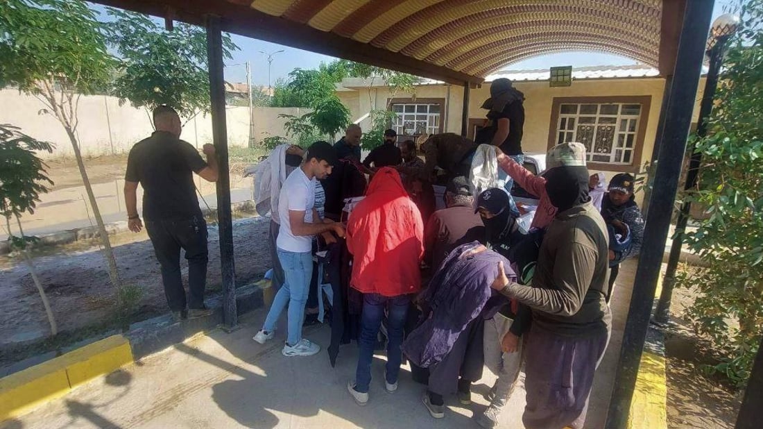 ديالى: ملابس شتوية لعمال النظافة قدمها التجار في بعقوبة (صور)