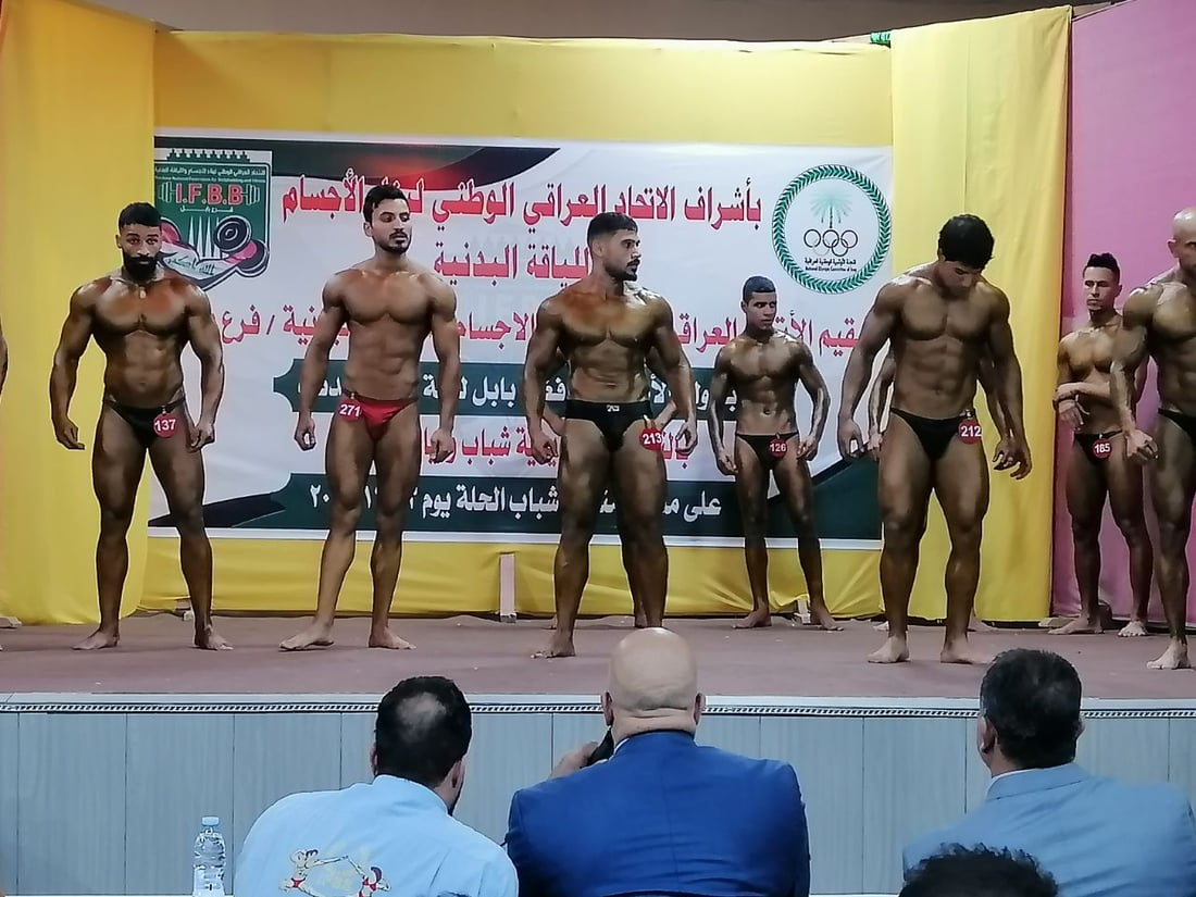 صور: بابل تستعرض “عضلاتها” بـ60 لاعباً.. أندية كمال الأجسام تتنافس على المنتخب