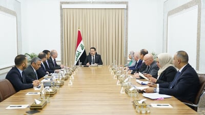 السوداني يجتمع بـ “آرنست” و”يونغ” لمتابعة تطوير المصارف الحكومية