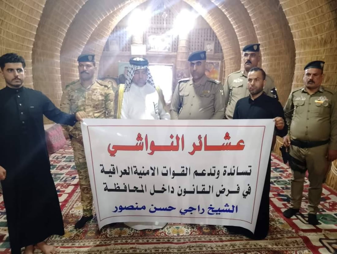 شرطة الناصرية ترد على التظاهرات بلافتات من مضايف الشيوخ.. “العشائر معنا” (صور)