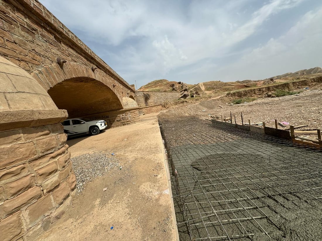 صور: الخبراء الأتراك باشروا بإعادة الحياة إلى أقدم جسر عثماني في كركوك