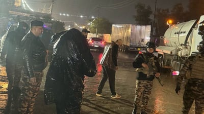 Heavy rain overwhelms Baghdad drainage system, flooding streets