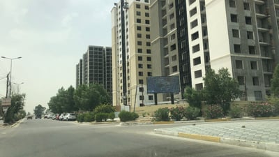 عمارات ابتلعت حدائقنا.. سكان حي الحسين البغدادي غير معجبين بحركة البناء في المنطقة