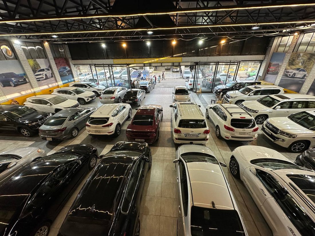 ذوق الموصل في السيارات يتغير بعد الحرب نحو الأمريكي والأسود.. وللنساء حصتهن (صور)