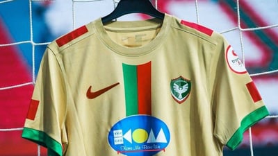 ئامەد سپۆر؛ دوو سزای لەسەریەک لەبەرامبەر دروشمێکی کوردی