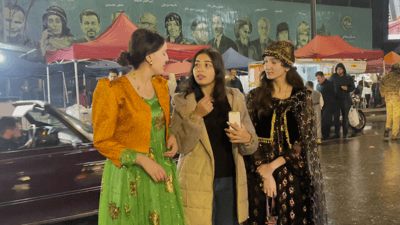 لە سەهۆڵەکەی سلێمانی لەژێر باران هاوڵاتییان بەشداری چالاکیەکانی نەورۆز دەکەن