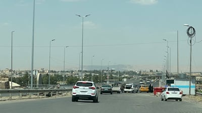 صور: جسر نينوى الخامس يعمل بمسار واحد.. والعمليات تفتح شارعاً مغلقاً منذ 2003