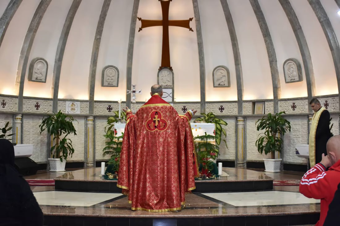 Photos: Somber Christmas Mass in Hamdaniya