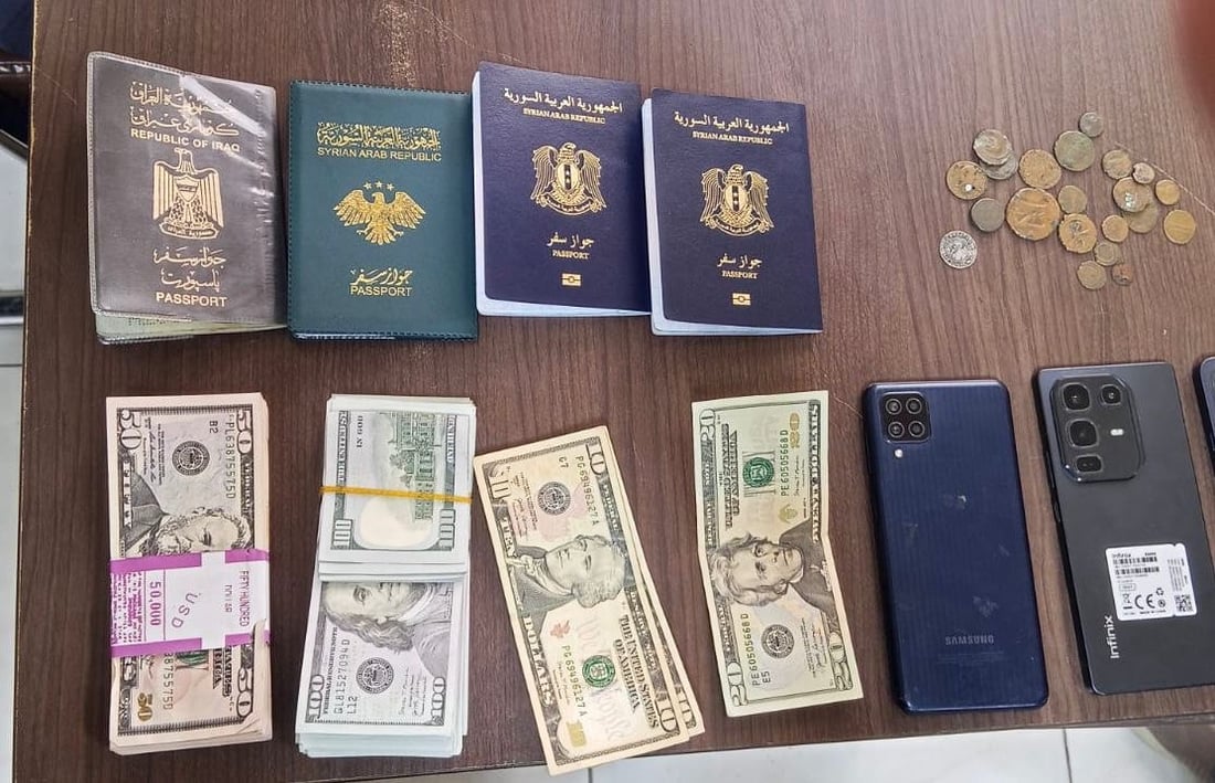Driver arrested at Al-Qaim border for smuggling ancient coins, fake currency, and foreign documents