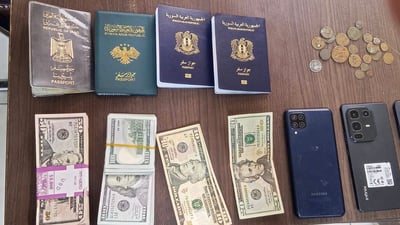 Driver arrested at Al-Qaim border for smuggling ancient coins, fake currency, and foreign documents