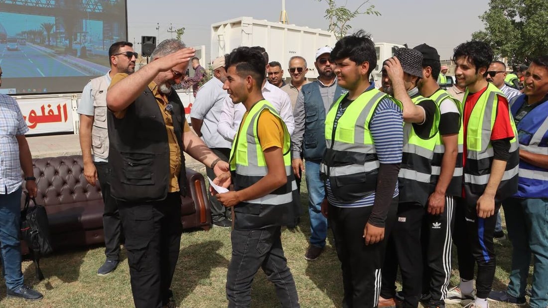 الفلوجة تحتفل بعمالها وتكرمهم 150 ألف دينار (صور)