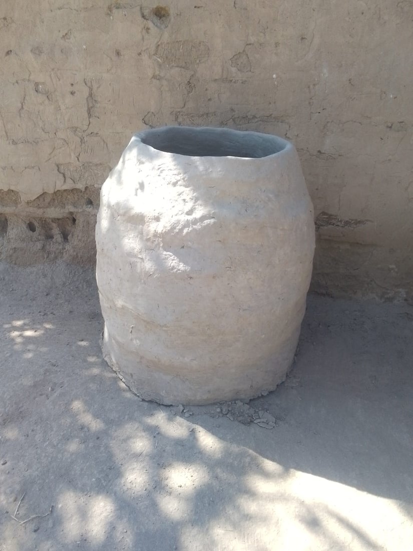 Diwaniyah women keep tradition alive with clay ovens for bread baking