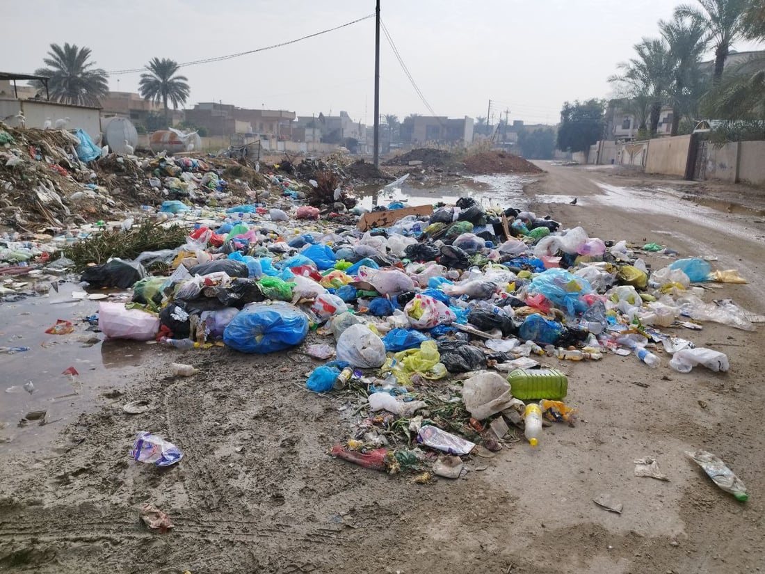 صور: 40% من شوارع الحلة غارقة بالنفايات.. والبلدية: نحتاج مضاعفة عدد الآليات