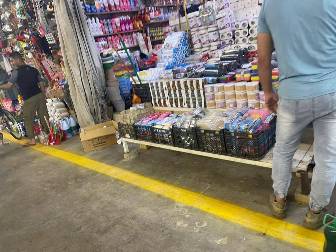 الفلوجة انتهت من ترسيم حدود سوق “النزيزة”.. لا بضائع بعد الخط الأصفر (صور) 